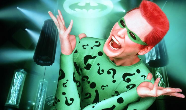 Jim Carrey interpretando a El Acertijo en Batman Forever también padece TDA.