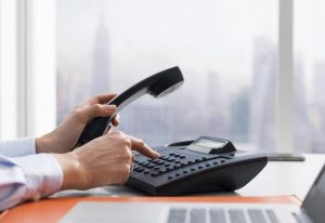 female-office-worker-making-a-phone-call-5x48pm3